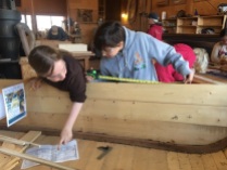 Emelia and Chloe measuring the location of their frame