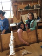 Cosey Mo and Isabella patterning a frame